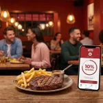 Application de fidélité Hippopotamus sur une table de restaurant avec une entrecôte.