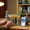 Construction d'un set LEGO adulte avec l'application LEGO Insiders ouverte.