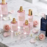 Flacons de parfums Suddenly et G. Bellini de Lidl posés sur une étagère élégante, imitant des parfums de luxe.